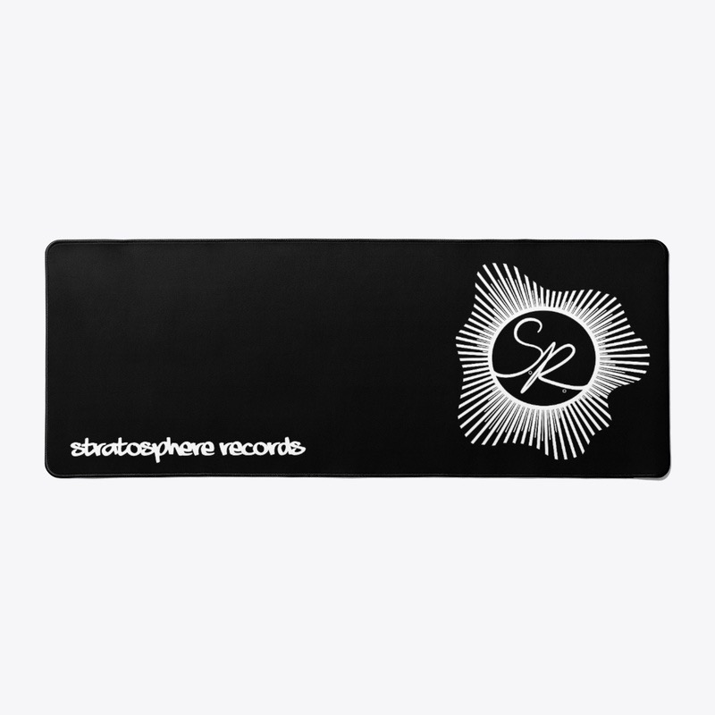 Large black desk mat with the SR sunburst logo at one end and the Stratosphere Records wordmark at the other